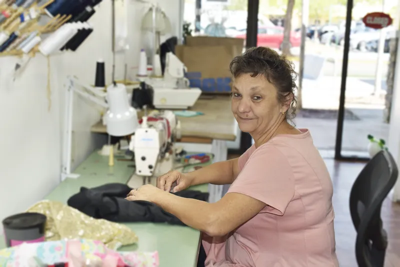 Erika, seamstress at JM Cleaners